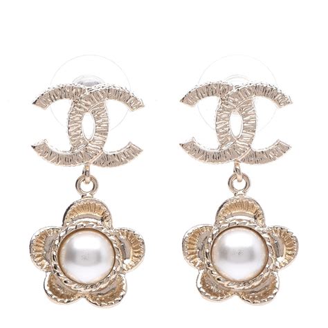 chanel camellia ring gold|Chanel camellia pearl earrings.